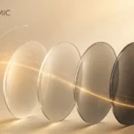 Photochromic optical lenses demonstrating light-adaptive technology and protection in warm cream-toned design.